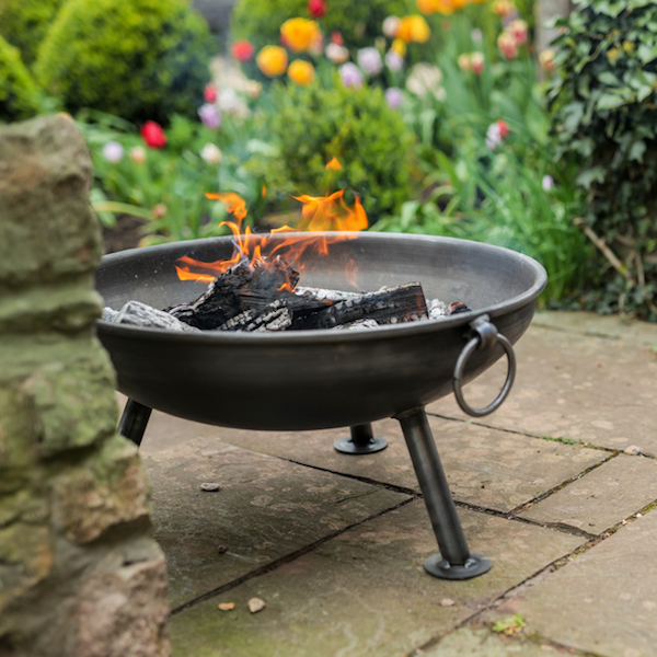 Celeste-Fire-Pit-Lifestyle-lit-in-garden-Firepits-PrioryFarmGardenCentre